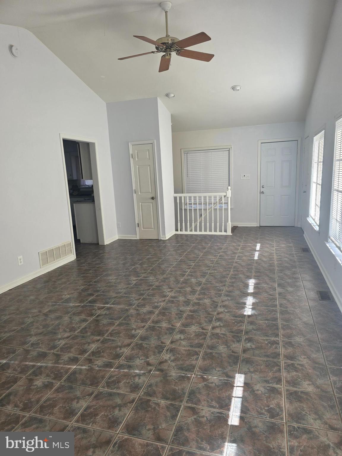 537 Centerton Road Pittsgrove, NJ 08318 - Photo 6 of 28 a view of a livingroom with a chandelier fan and windows