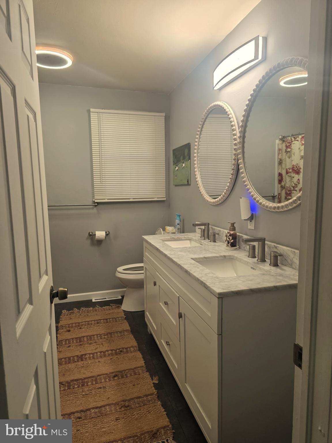 537 Centerton Road Pittsgrove, NJ 08318 - Photo 9 of 28 a bathroom with a granite countertop sink mirror and toilet