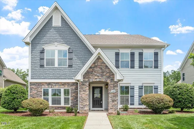 a picture of a bathroom with a sink and mirror