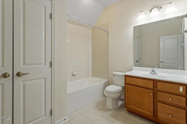 a view of staircase with railing and white walls