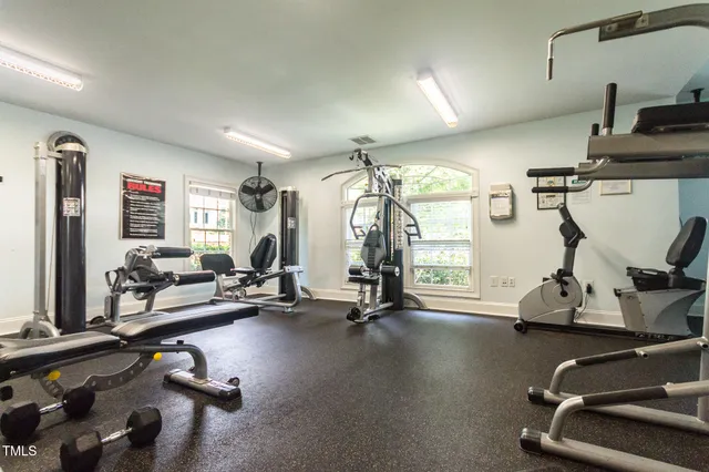 a view of a swimming pool and an outdoor seating