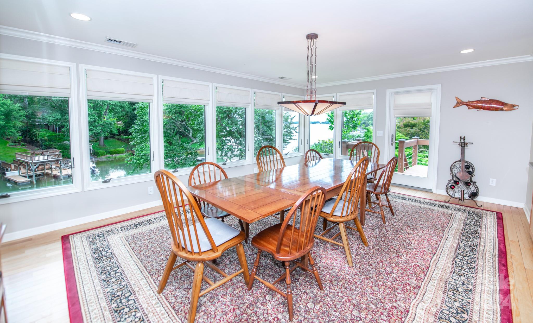 4000 Lake Shore Road South Denver, NC 28037 - Photo 15 of 46 a view of a dining room with furniture window and outside view