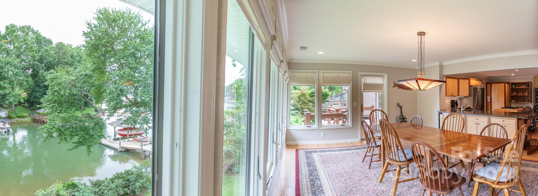 4000 Lake Shore Road South Denver, NC 28037 - Photo 17 of 46 a view of a dining room with furniture window and outside view