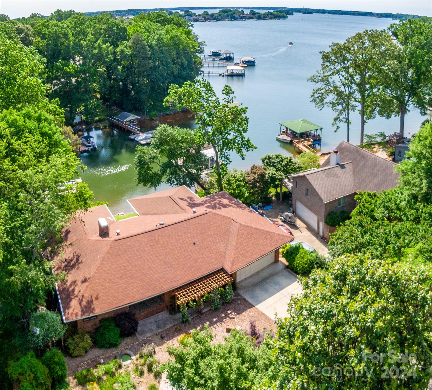 4000 Lake Shore Road South Denver, NC 28037 - Photo 2 of 46 an aerial view of a house with garden space and lake view