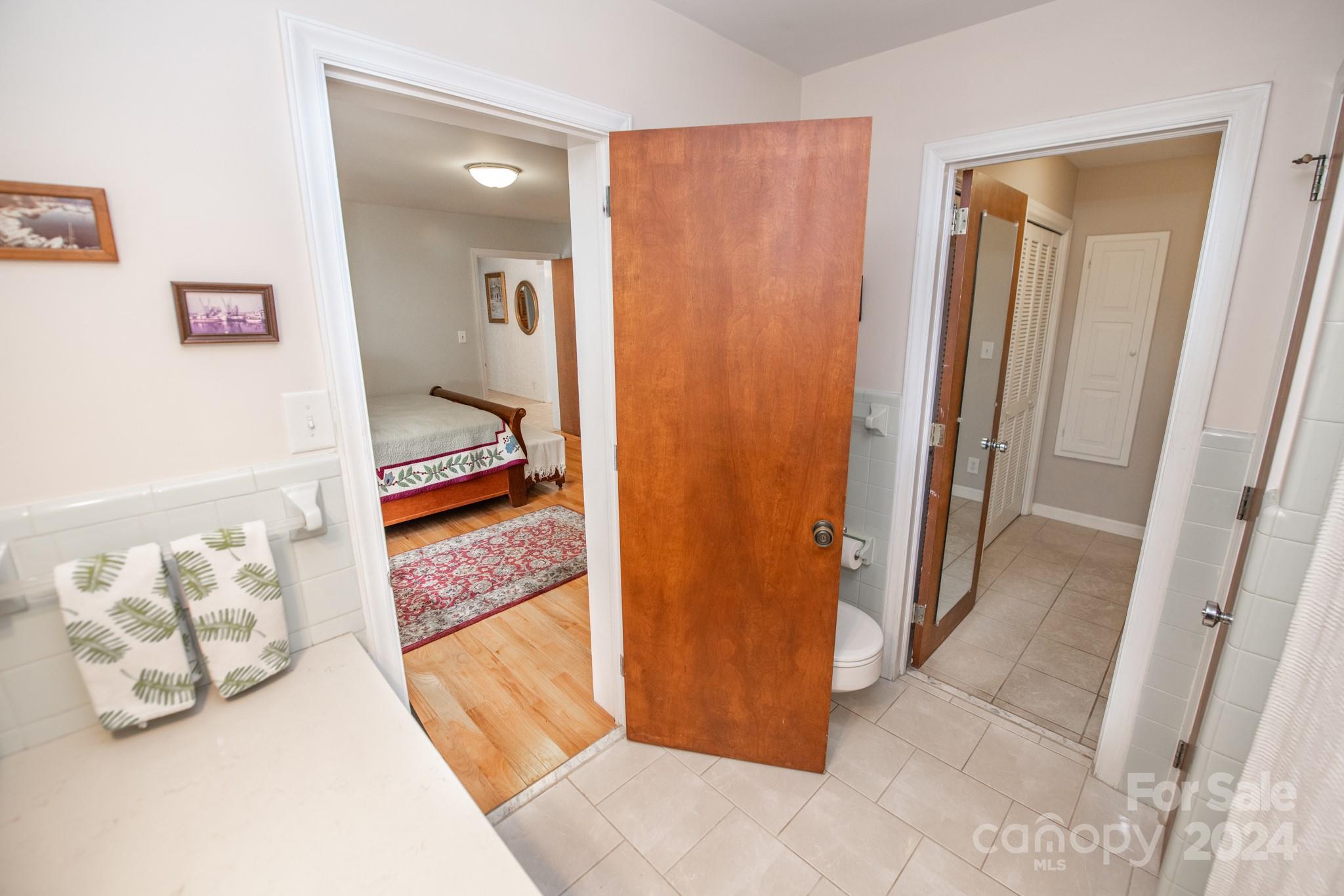 4000 Lake Shore Road South Denver, NC 28037 - Photo 30 of 46 a view of a hallway with bathroom and mirror