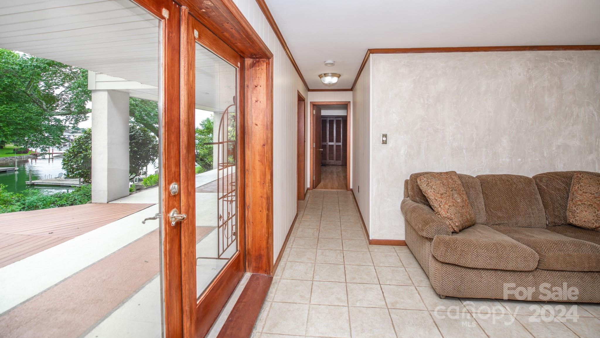4000 Lake Shore Road South Denver, NC 28037 - Photo 34 of 46 a entryway with furniture and floor to ceiling window