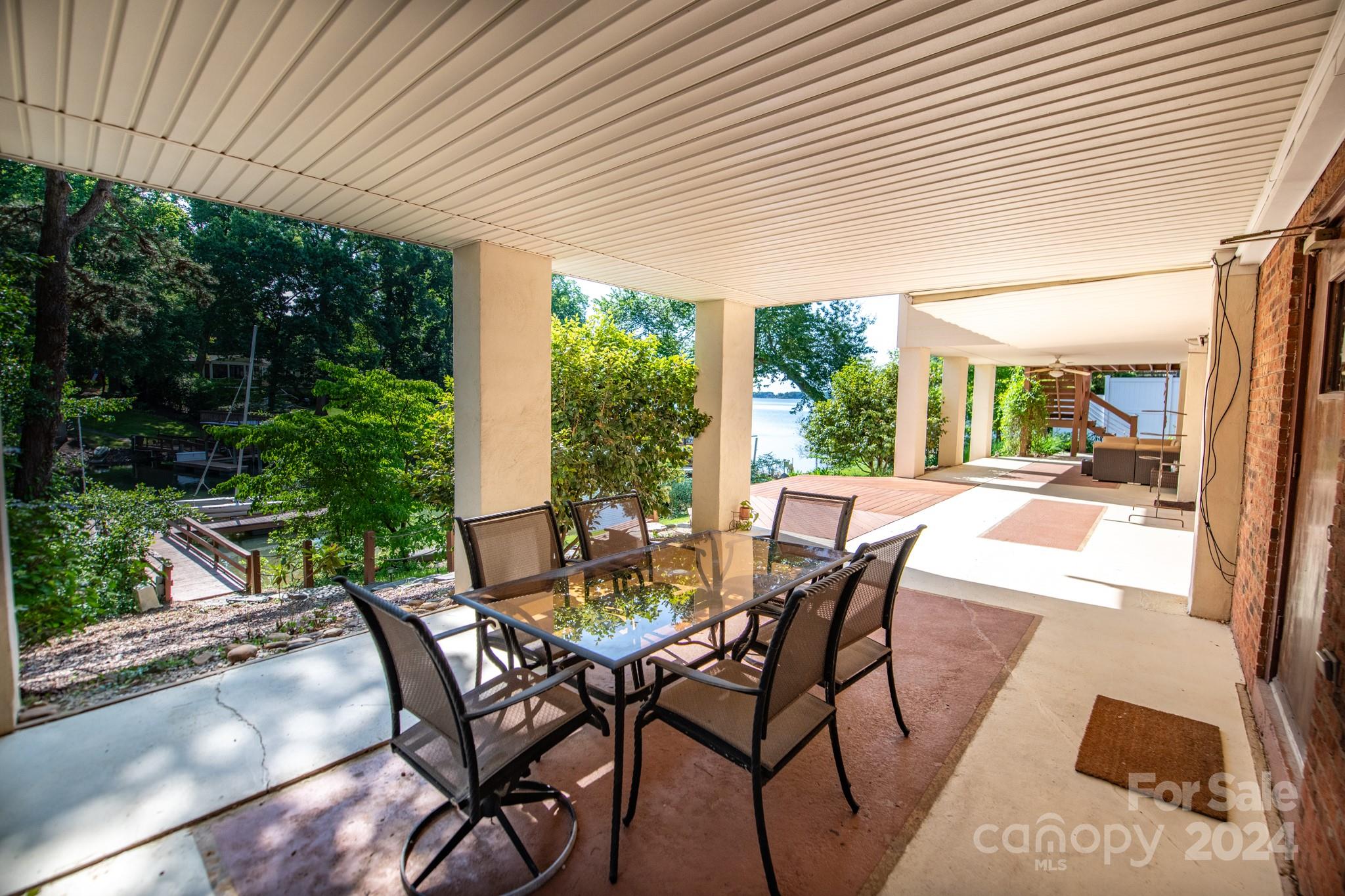 4000 Lake Shore Road South Denver, NC 28037 - Photo 39 of 46 a view of an outdoor dining space with furniture and garden view