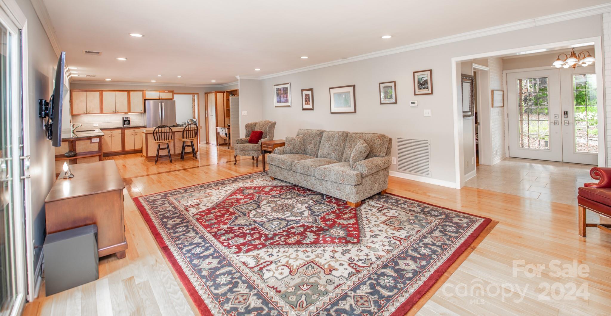 4000 Lake Shore Road South Denver, NC 28037 - Photo 10 of 46 a living room with furniture and a rug