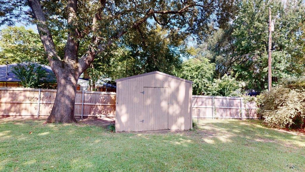 908 Rolling Drive Athens, TX 75751 - Photo 31 of 31 a view of backyard with green space