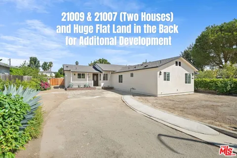 a house view with a outdoor space