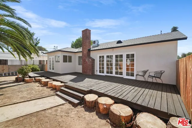 a front view of a house with wooden floor