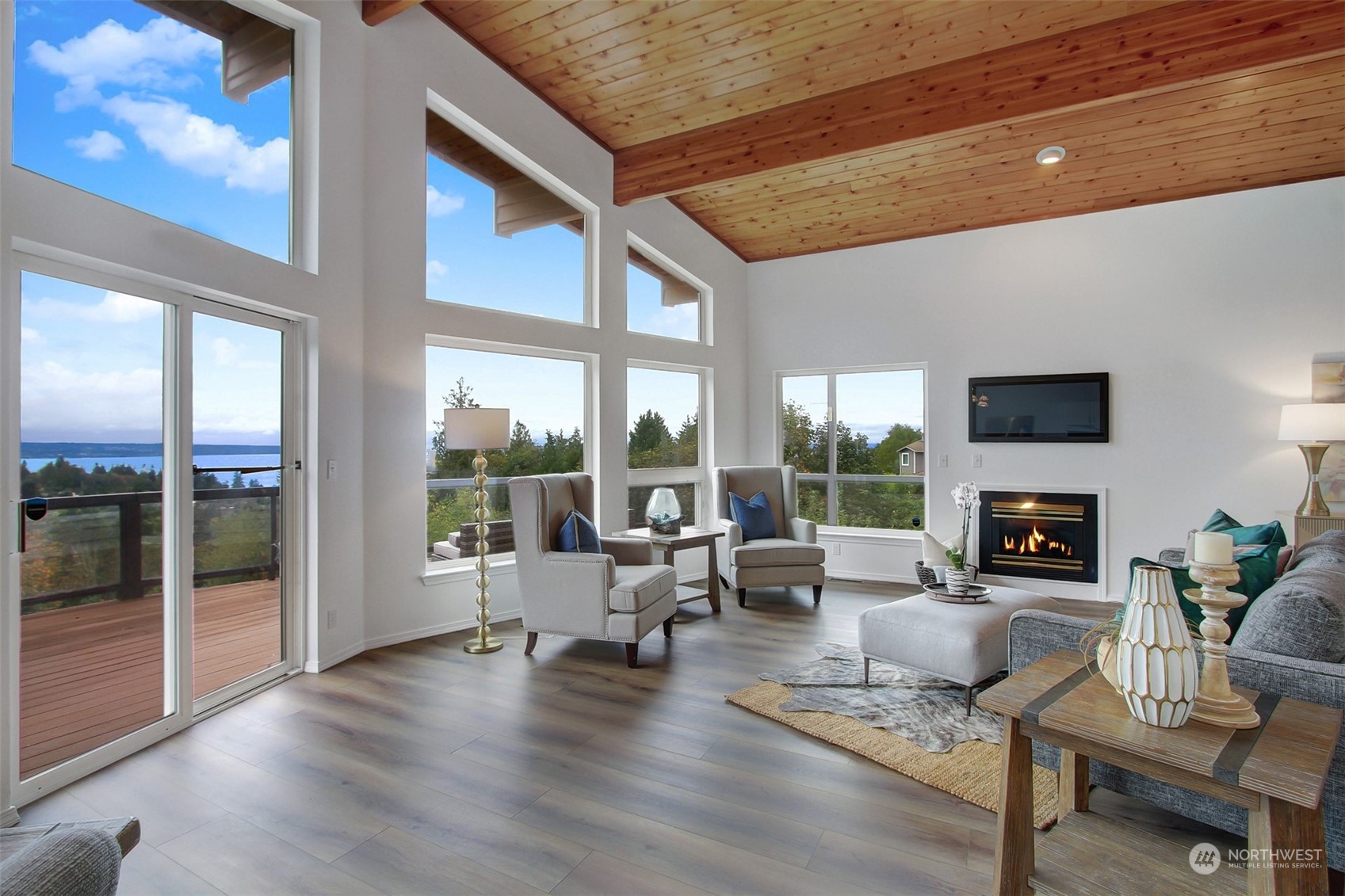 4824 Seahurst Avenue Everett, WA 98203 - Photo 12 of 33 a living room with fireplace furniture and a large window