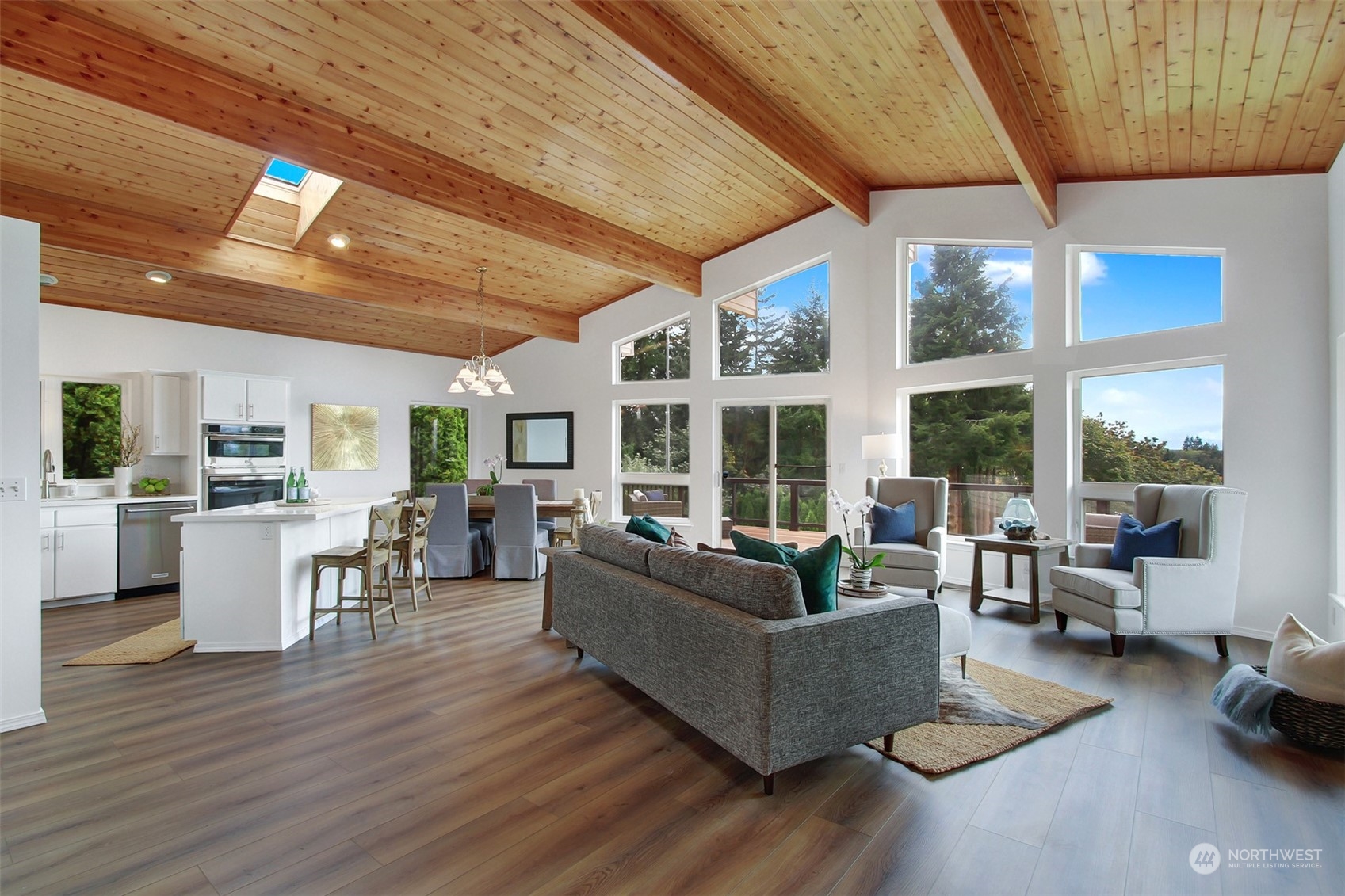 4824 Seahurst Avenue Everett, WA 98203 - Photo 17 of 33 a living room with furniture and large windows