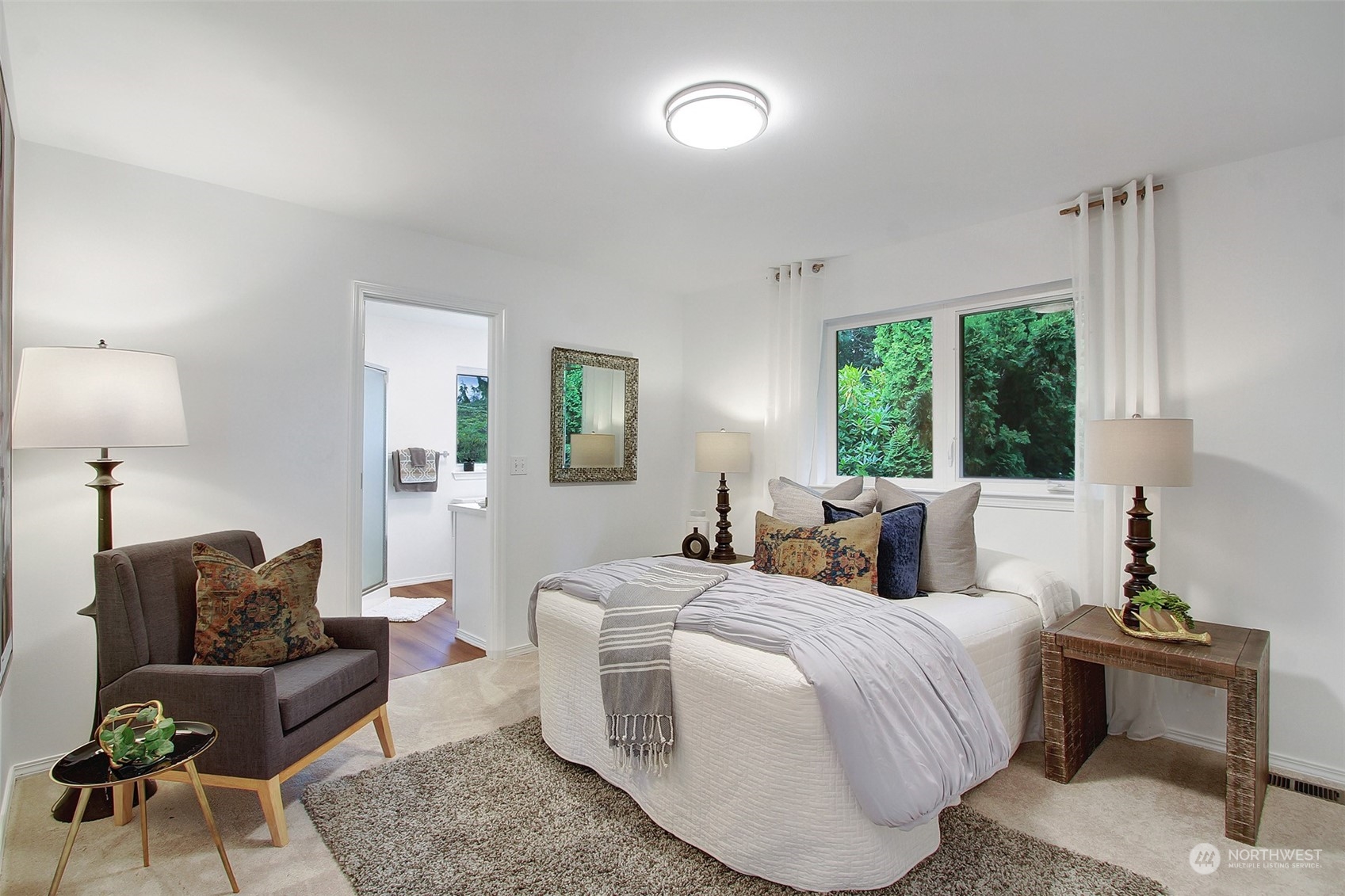 4824 Seahurst Avenue Everett, WA 98203 - Photo 19 of 33 a bedroom with a bed and a couch