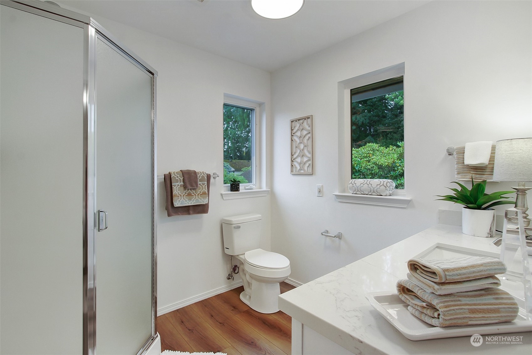 4824 Seahurst Avenue Everett, WA 98203 - Photo 22 of 33 a bathroom with a sink toilet and a window