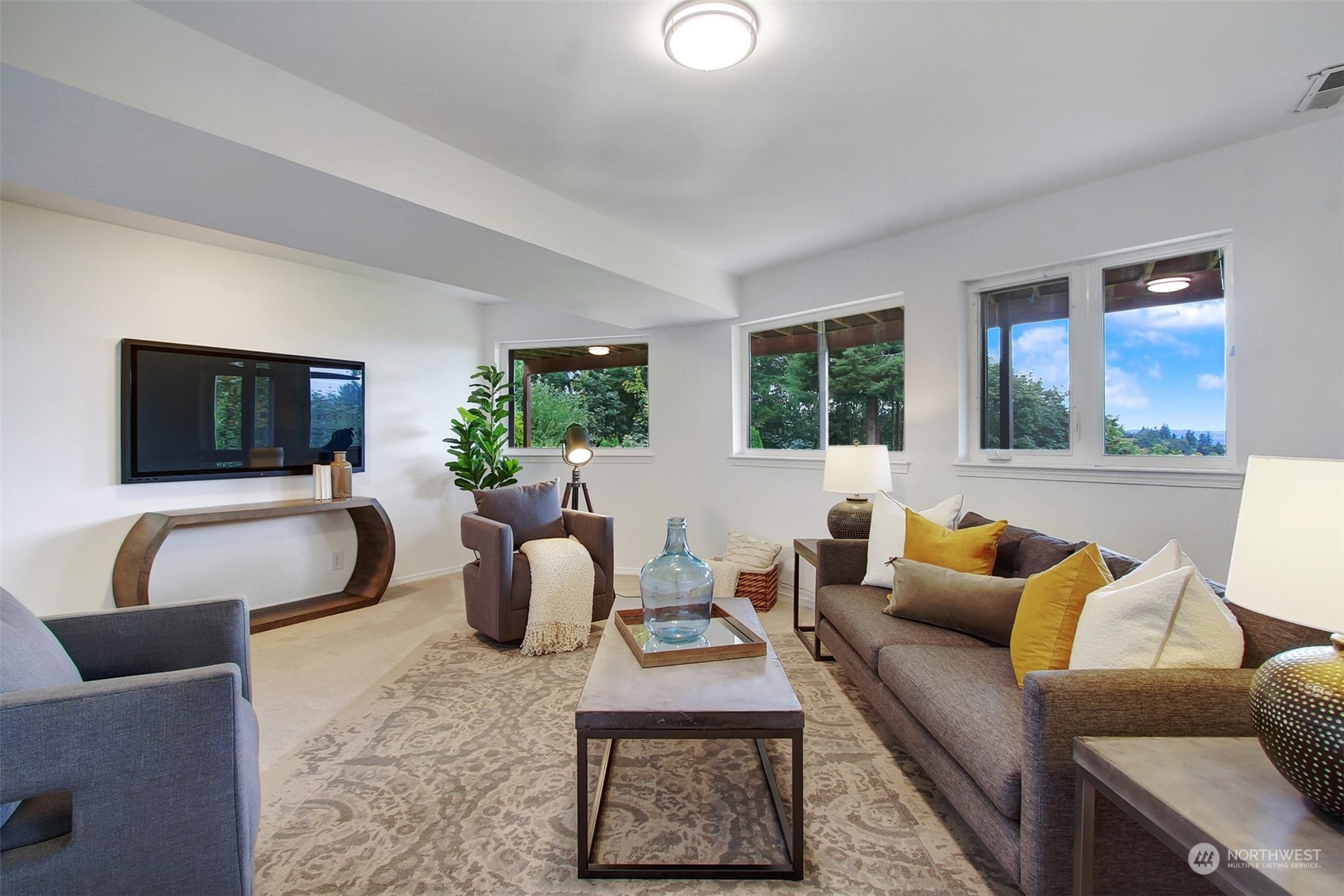 4824 Seahurst Avenue Everett, WA 98203 - Photo 31 of 33 a living room with furniture and a flat screen tv