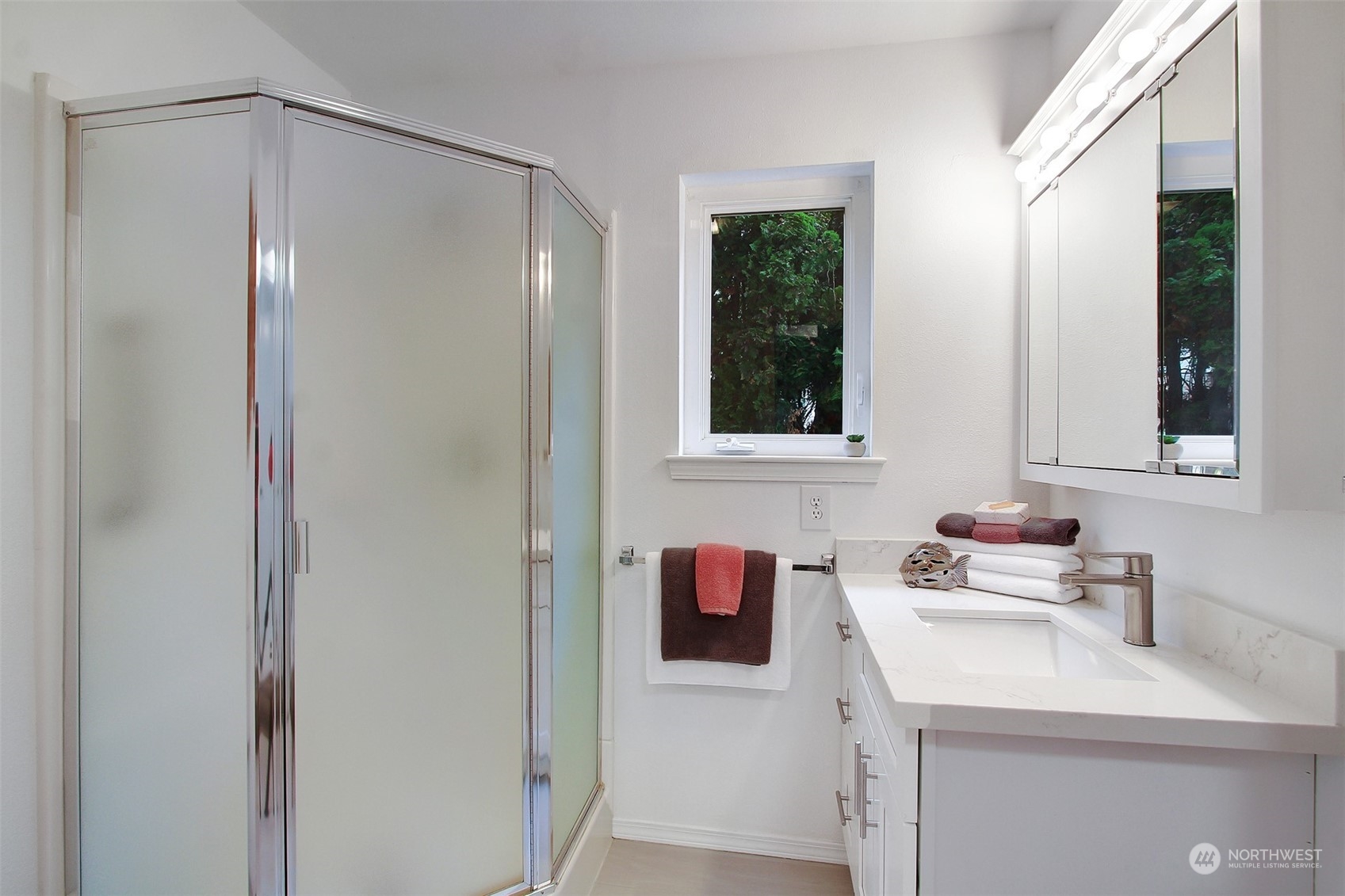 4824 Seahurst Avenue Everett, WA 98203 - Photo 32 of 33 a bathroom with a sink and a mirror