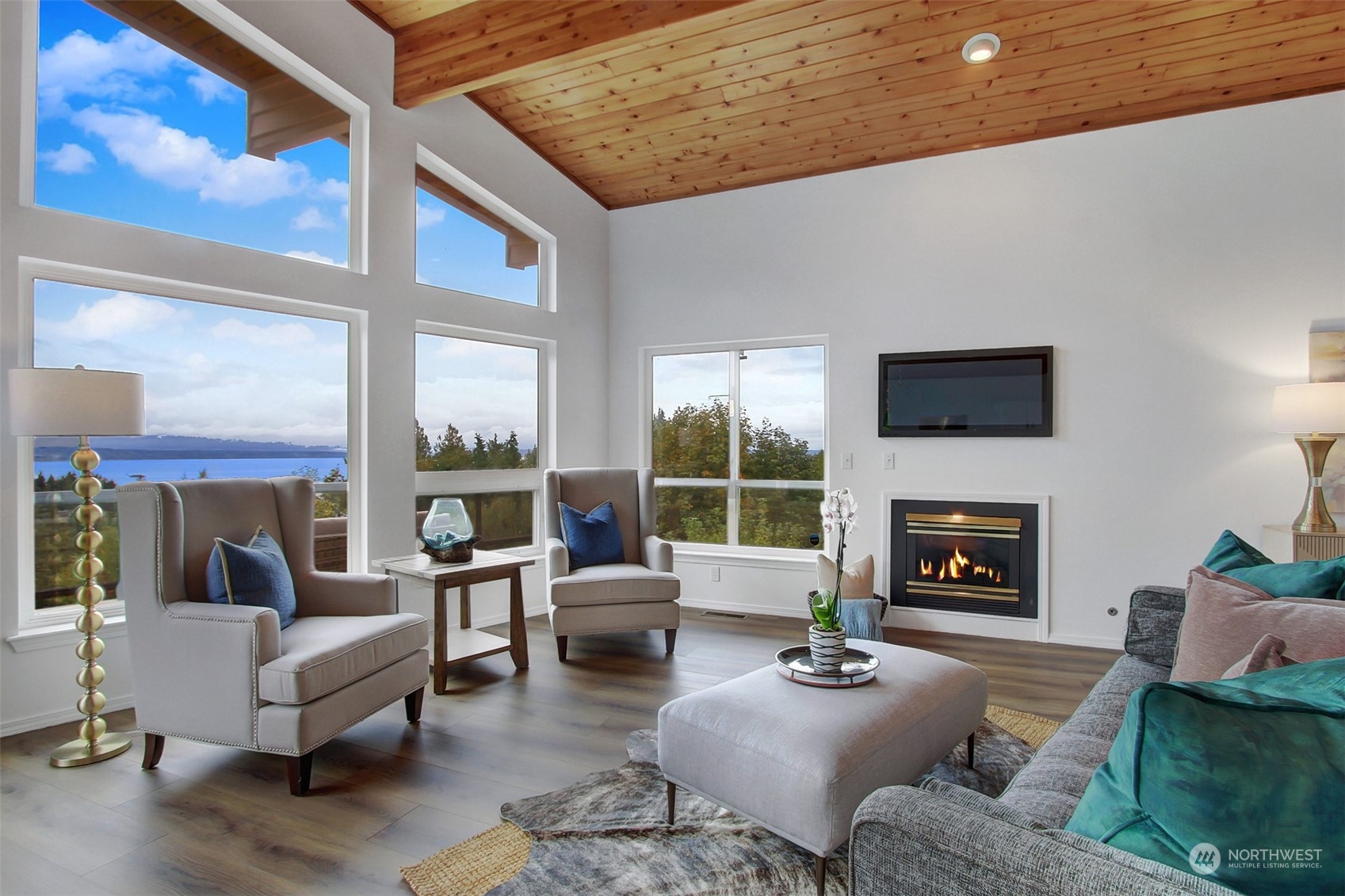 4824 Seahurst Avenue Everett, WA 98203 - Photo 8 of 33 a living room with furniture fireplace and a large window