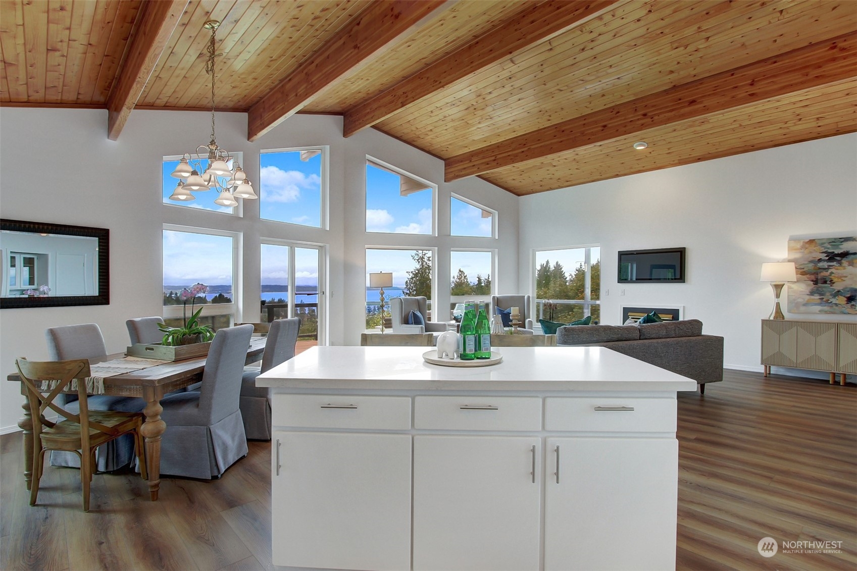 4824 Seahurst Avenue Everett, WA 98203 - Photo 10 of 33 a view of a dining room with furniture window and wooden floor