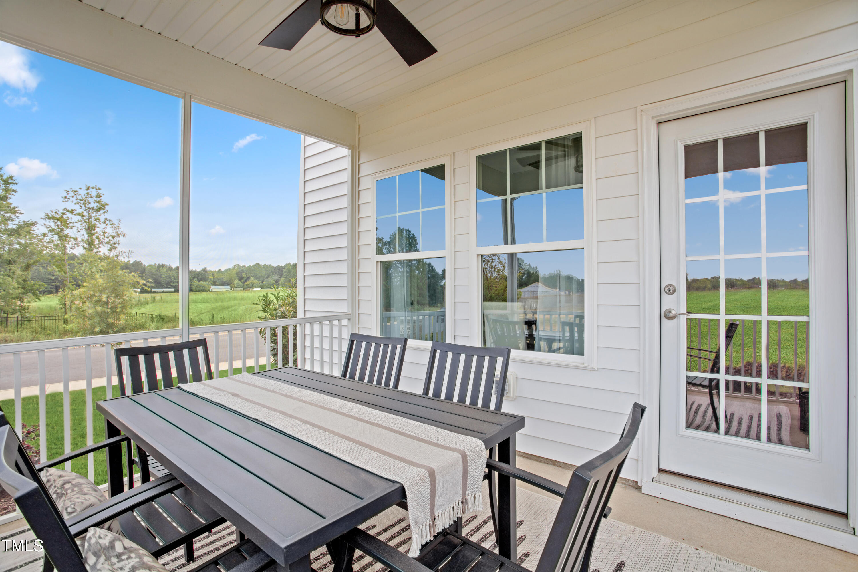 2011 Cross Bones Boulevard, Unit 41 Durham, NC 27703 - Photo 14 of 14 a view of a two chairs and table in the balcony
