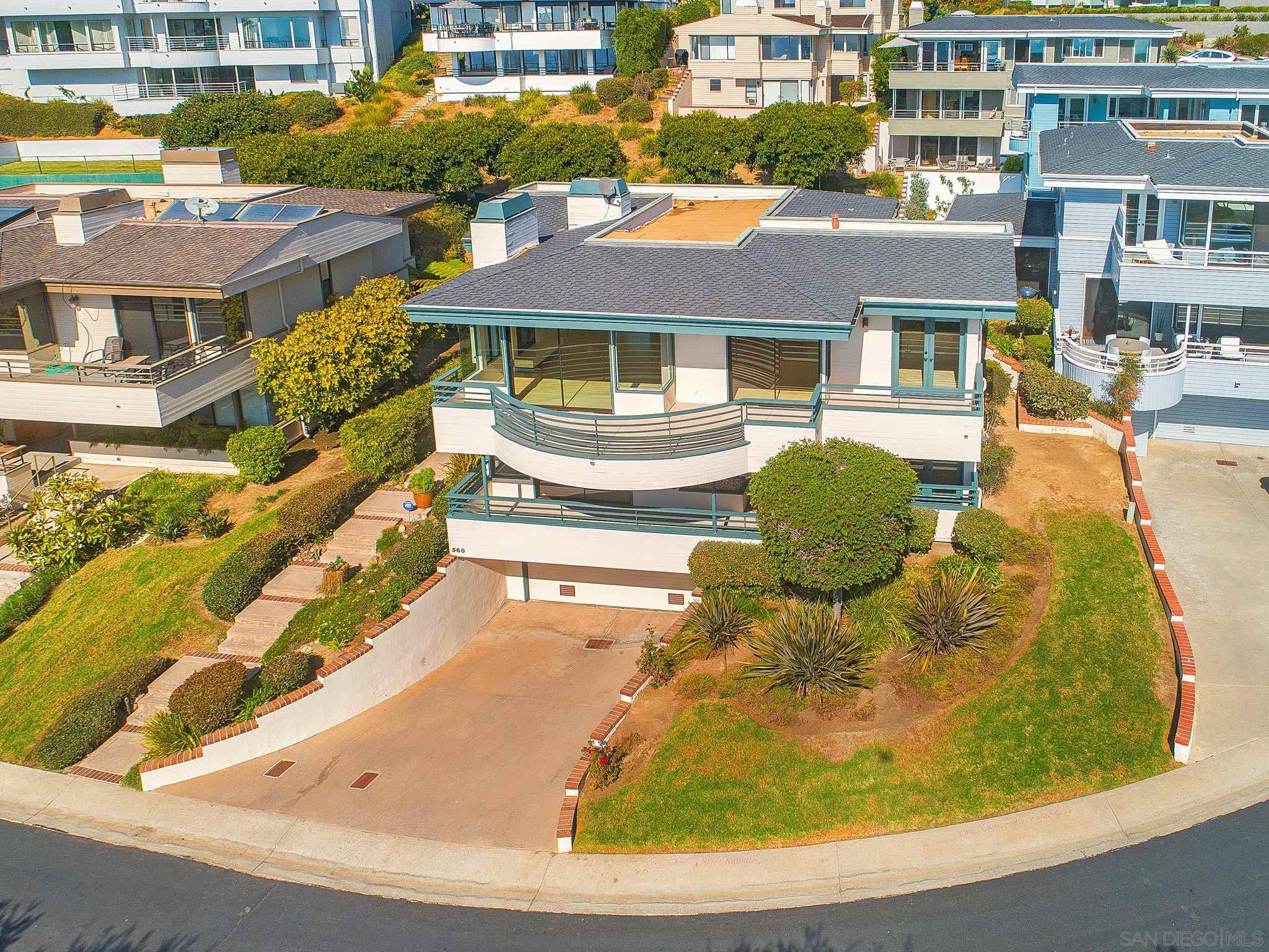 a view of a swimming pool with a lounge chairs
