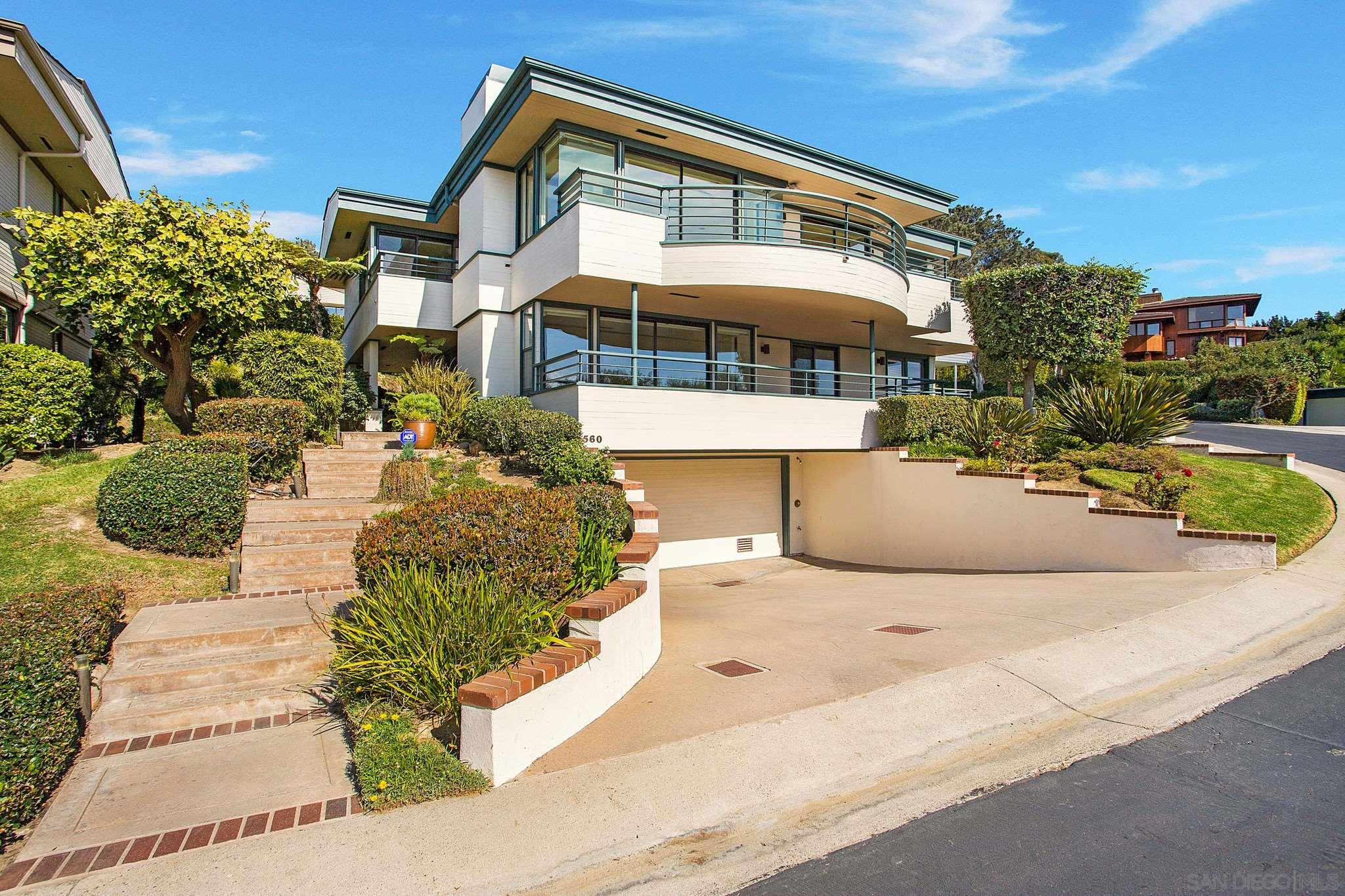 560 Torrey Point Road Del Mar, CA 92014 - Photo 2 of 25 a front view of a house with a yard