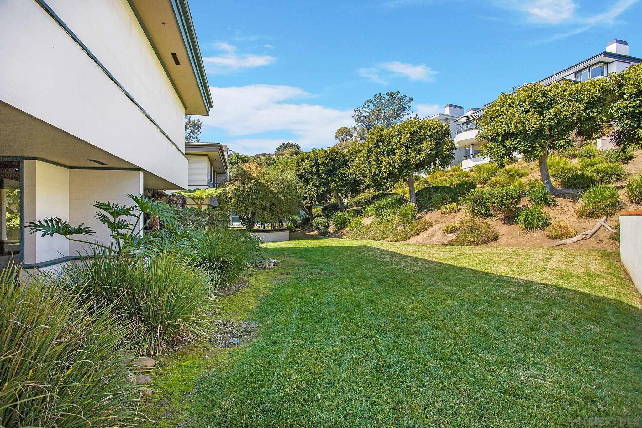 560 Torrey Point Road Del Mar, CA 92014 - Photo 22 of 25 a view of yard with swimming pool