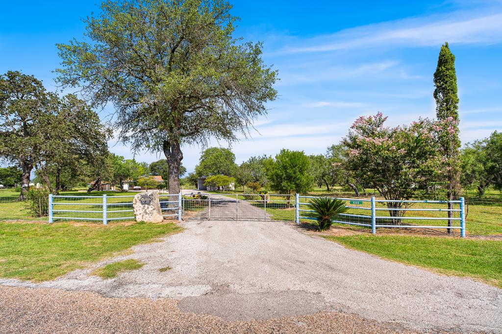 400 Blue Quail Lytle, TX 78052 - Photo 1 of 1 a view of a park with large trees