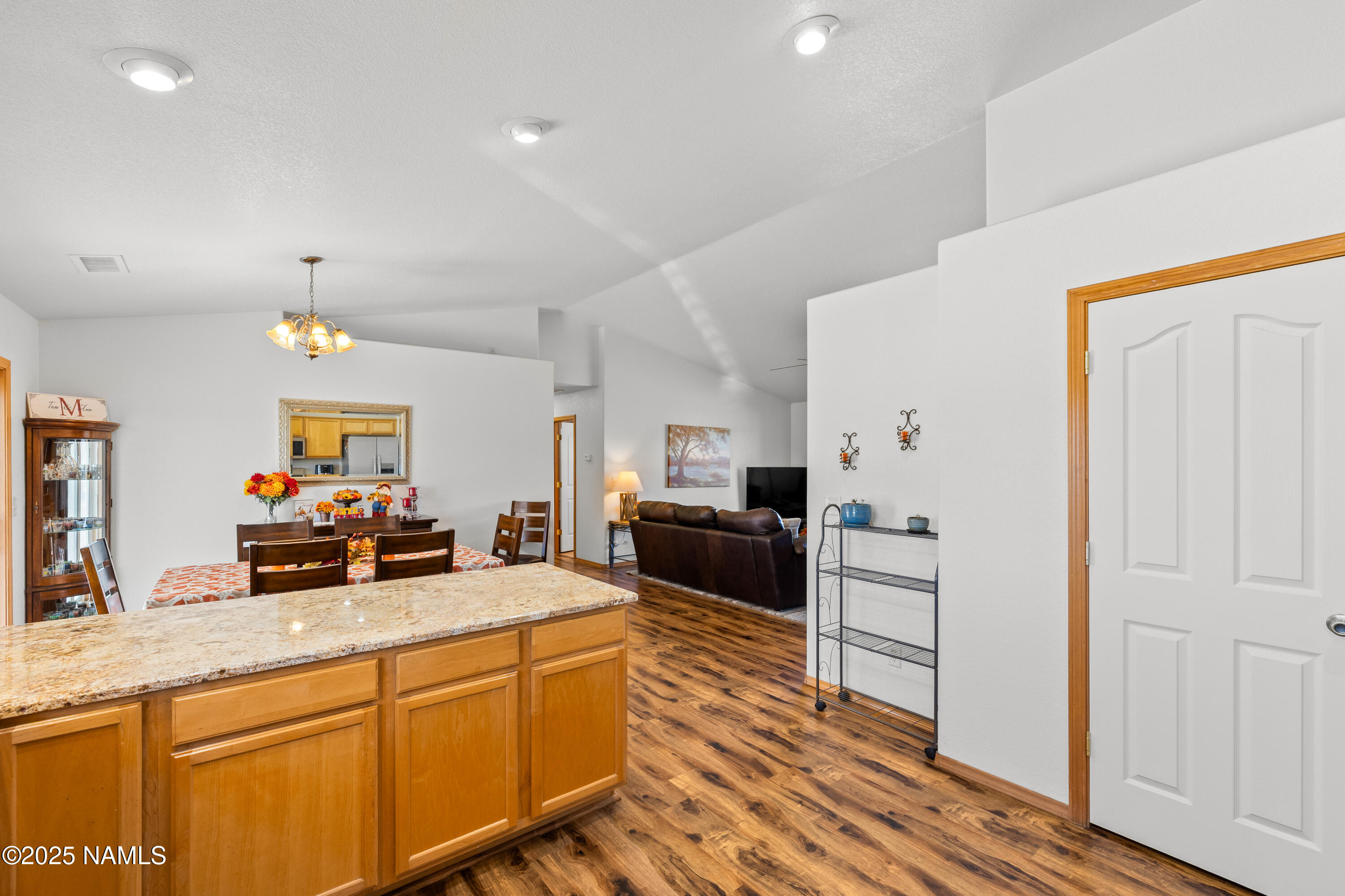 9662 North Aldrich Road Flagstaff, AZ 86004 - Photo 10 of 33 a kitchen with sink cabinets and wooden floor