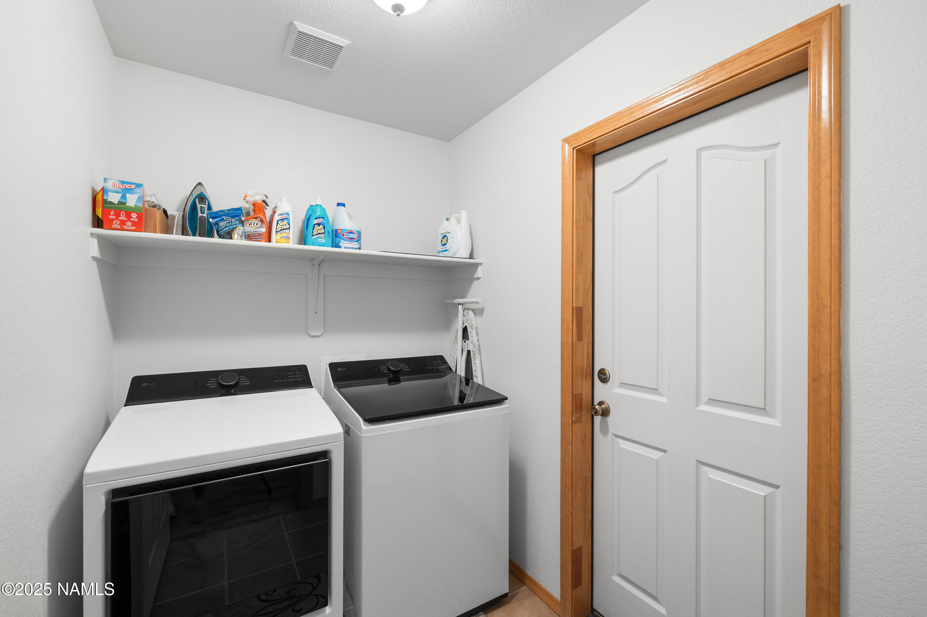9662 North Aldrich Road Flagstaff, AZ 86004 - Photo 11 of 33 a utility room with dryer and washer
