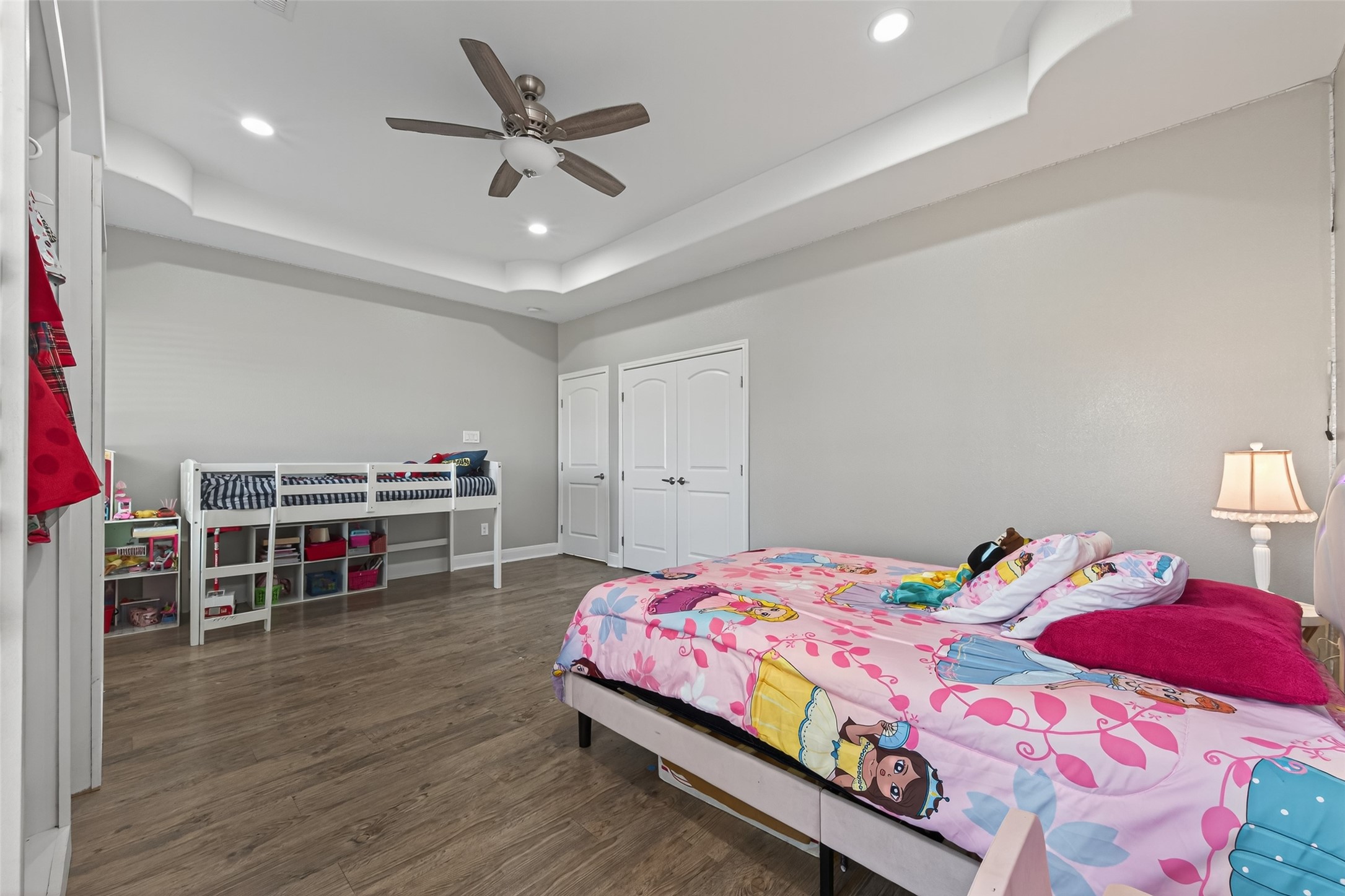 19477 Lazy Lane Porter, TX 77365 - Photo 14 of 26 a bedroom with a bed and a cabinets