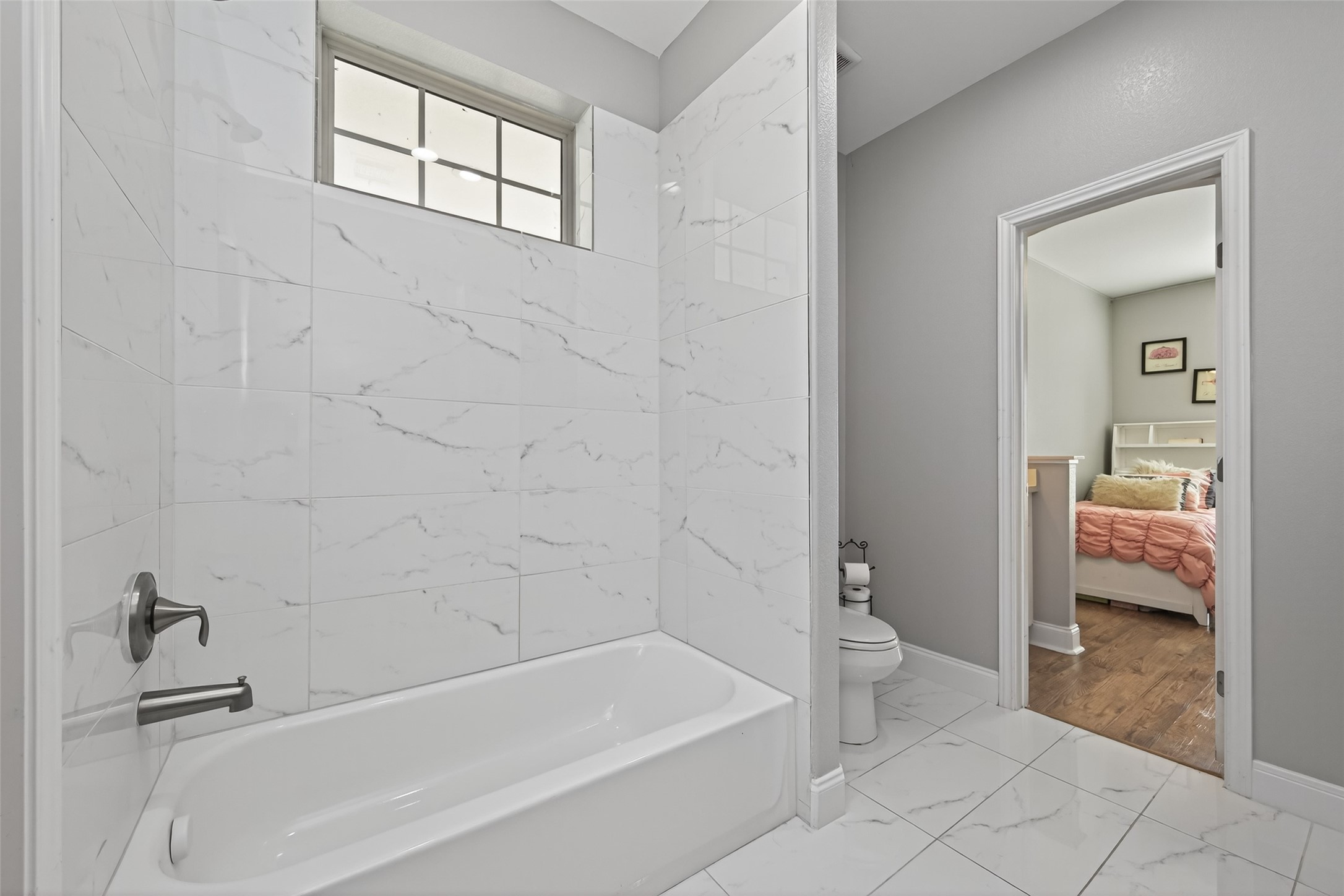 19477 Lazy Lane Porter, TX 77365 - Photo 18 of 26 a bathroom with a bathtub and a shower