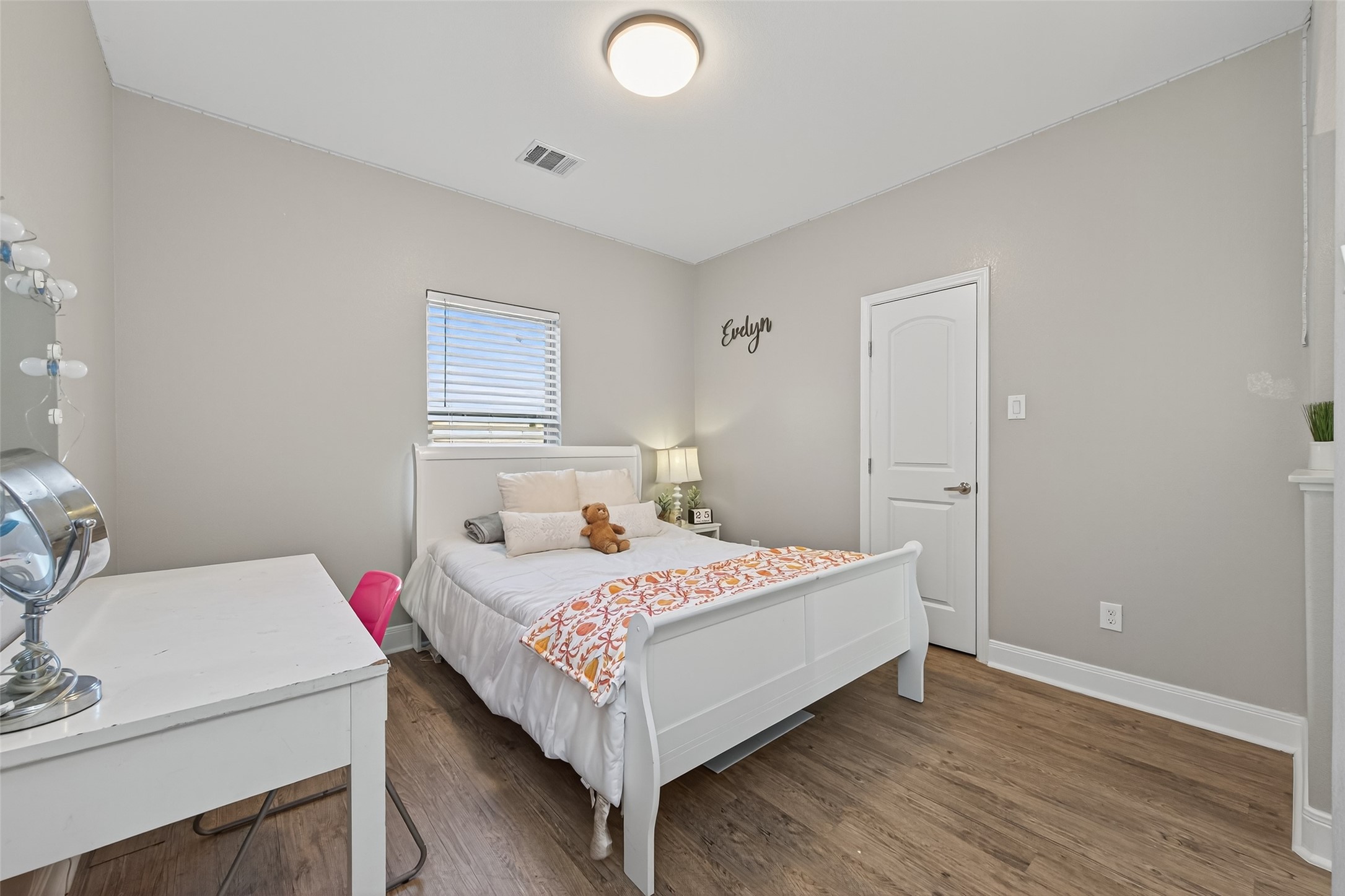 19477 Lazy Lane Porter, TX 77365 - Photo 20 of 26 a bedroom with a bed and a table