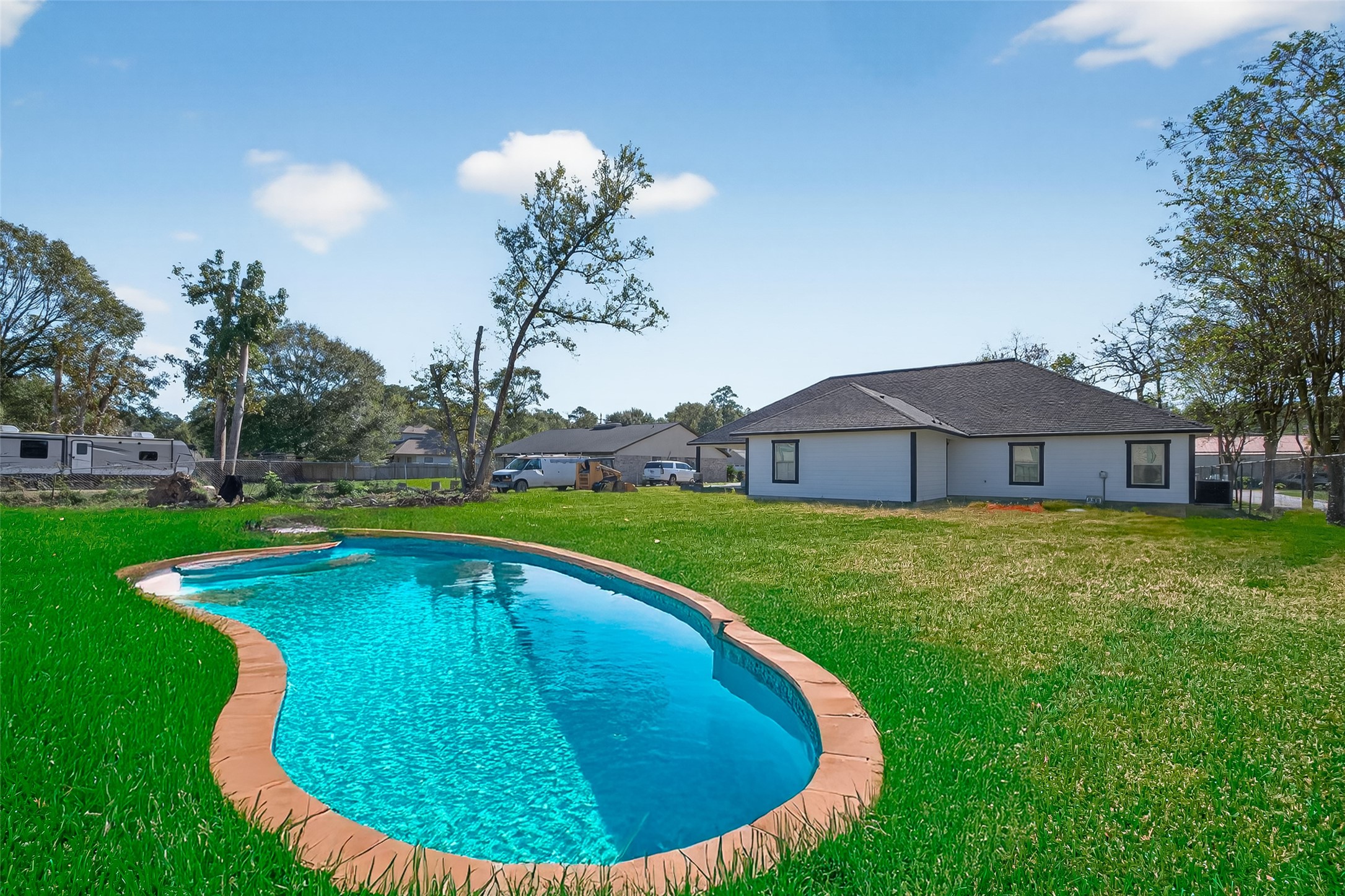 19477 Lazy Lane Porter, TX 77365 - Photo 24 of 26 a view of a house with a backyard