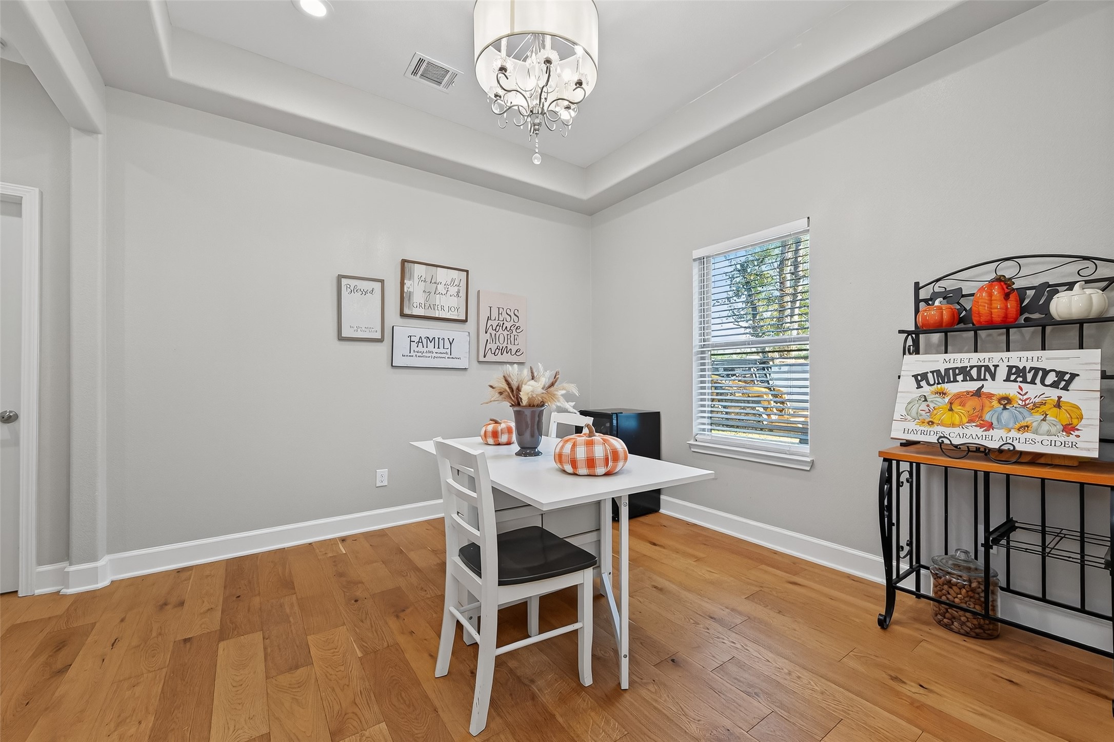 19477 Lazy Lane Porter, TX 77365 - Photo 25 of 26 a dining room with furniture a rug and wooden floor