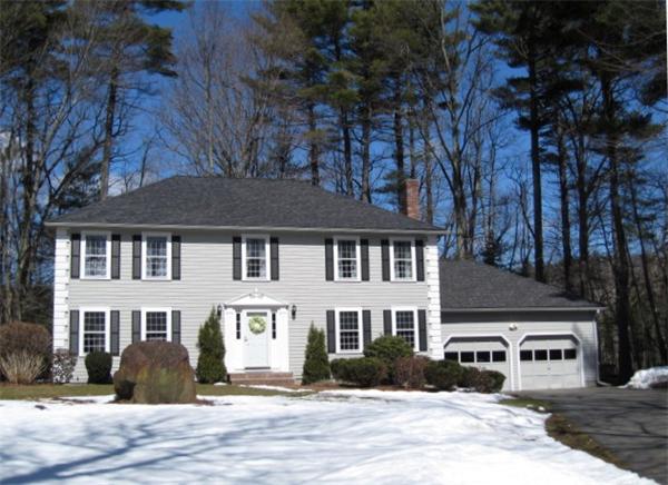 50 Sawmill Road North Andover, MA 01845 - Photo 1 of 25 a front view of a house with a yard