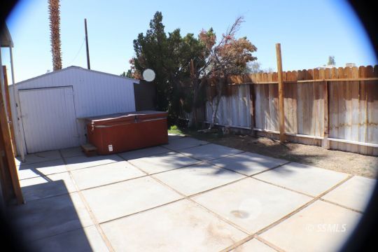 1241 South Mahan Street Ridgecrest, CA 93555 - Photo 16 of 28 a backyard of a house
