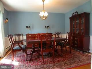 742 Mancill Road Wayne, PA 19087 - Photo 3 of 6 a view of a dining room with furniture and chandelier