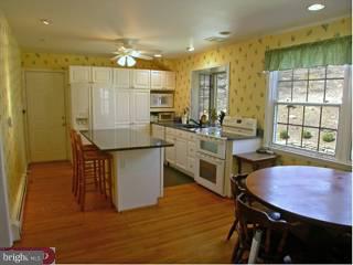 742 Mancill Road Wayne, PA 19087 - Photo 4 of 6 a kitchen with a table chairs sink and cabinets