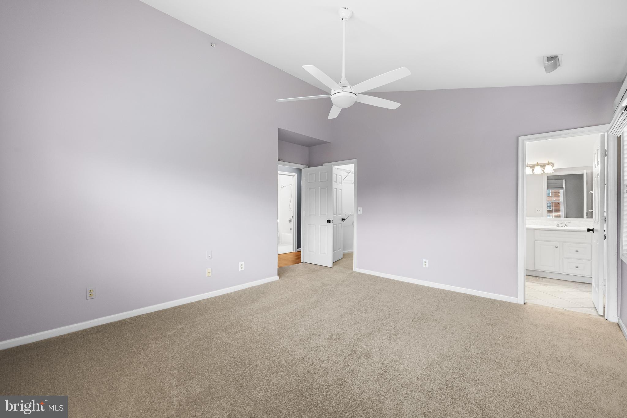 12204 Burncourt Road, Unit 302 Lutherville-Timonium, MD 21093 - Photo 20 of 27 a view of an empty room with a ceiling fan