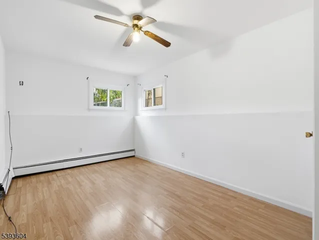 a view of a big room with wooden floor