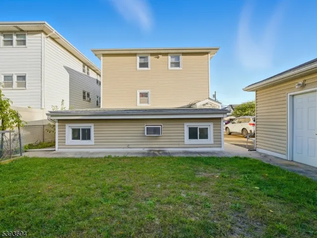 a view of a back yard of the house