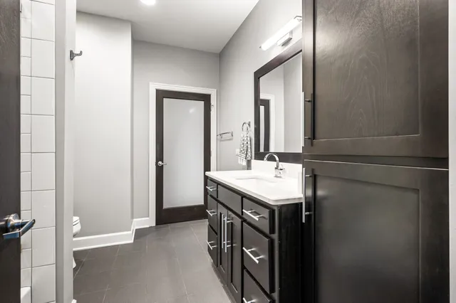 a view of a swimming pool with a patio