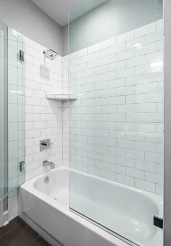 a view of a building with swimming pool and sitting area