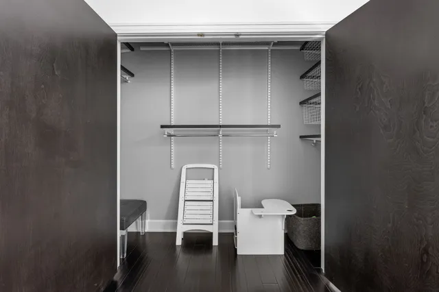 a lobby with furniture and wooden floor