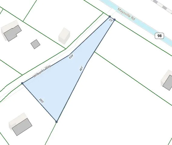 a view of backyard with outdoor and green space