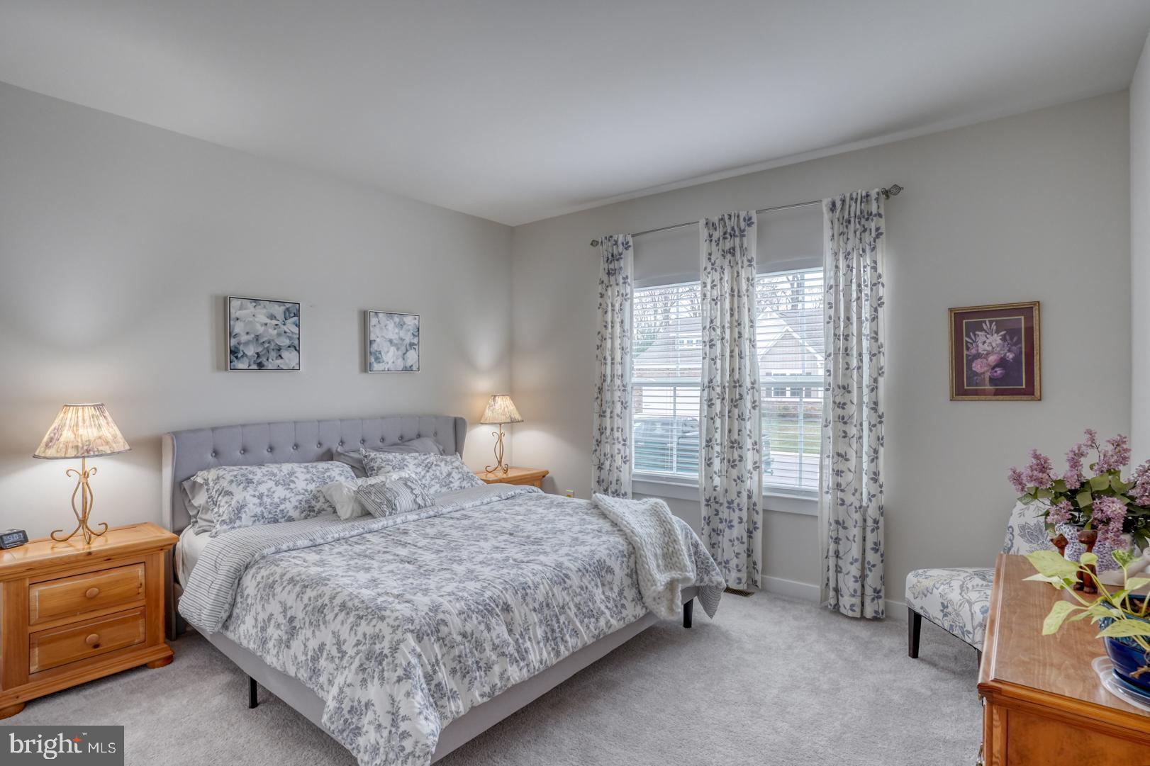 24077 Caldwell Circle Lewes, DE 19958 - Photo 39 of 60 a bedroom with a bed and a window