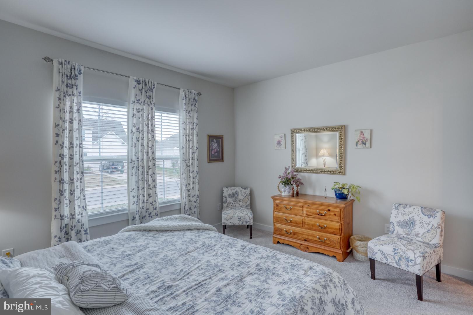 24077 Caldwell Circle Lewes, DE 19958 - Photo 40 of 60 a bedroom with furniture and a window
