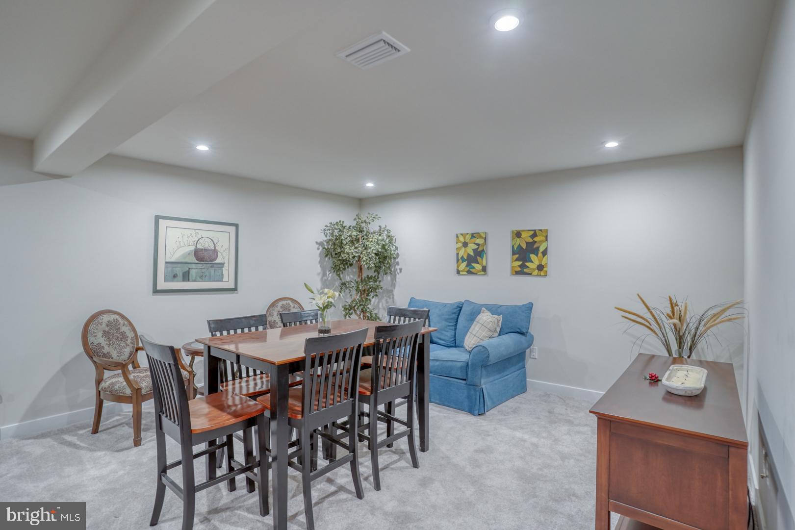 24077 Caldwell Circle Lewes, DE 19958 - Photo 50 of 60 a view of a dining room with furniture