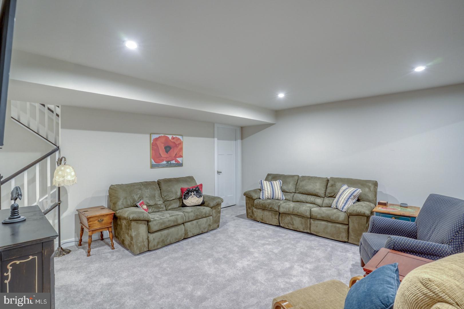 24077 Caldwell Circle Lewes, DE 19958 - Photo 51 of 60 a living room with furniture and a couch